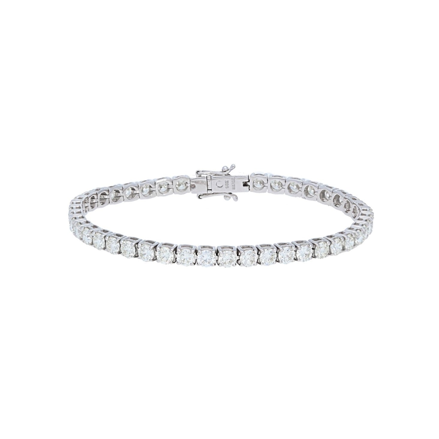 Stunning diamond tennis bracelet with white gold clasp from The Golden Jeweler Boutique.