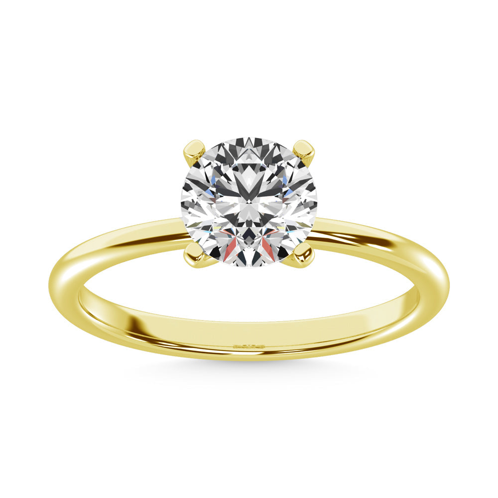 Gorgeous diamond solitaire ring in yellow gold available at The Golden Jeweler Boutique.